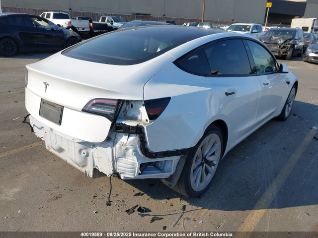5YJ3E1EA3MF929385 Tesla 2021
