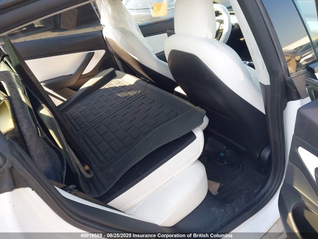 5YJ3E1EA3MF929385 Tesla 2021