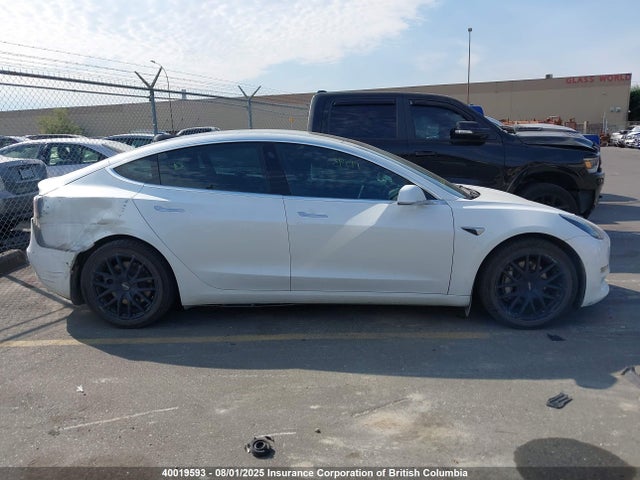 5YJ3E1EA0LF718630 Tesla 2020