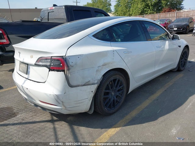5YJ3E1EA0LF718630 Tesla 2020