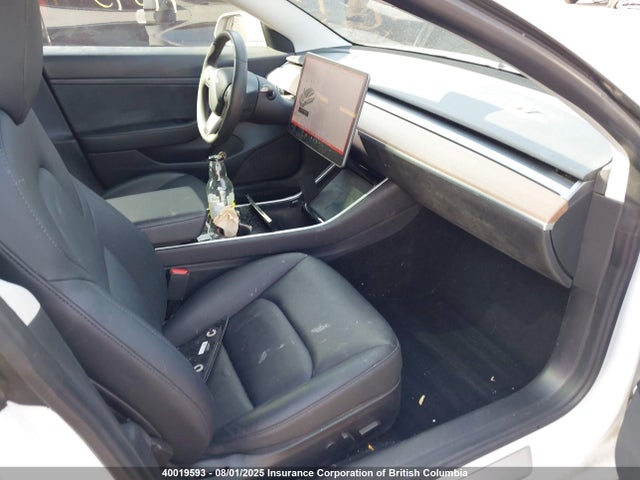 5YJ3E1EA0LF718630 Tesla 2020