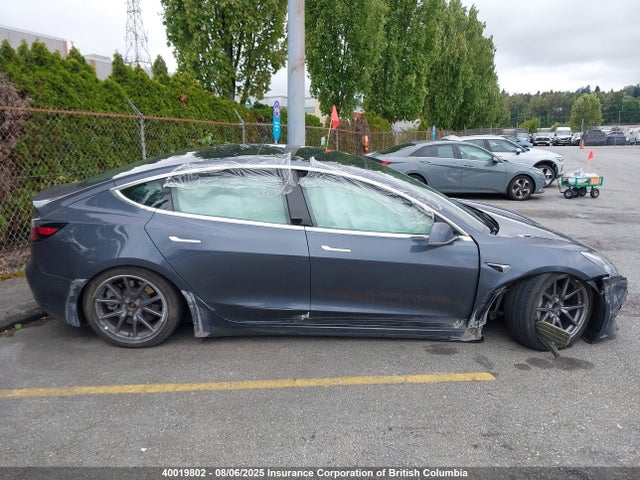 5YJ3E1EA4LF703189 Tesla 2020