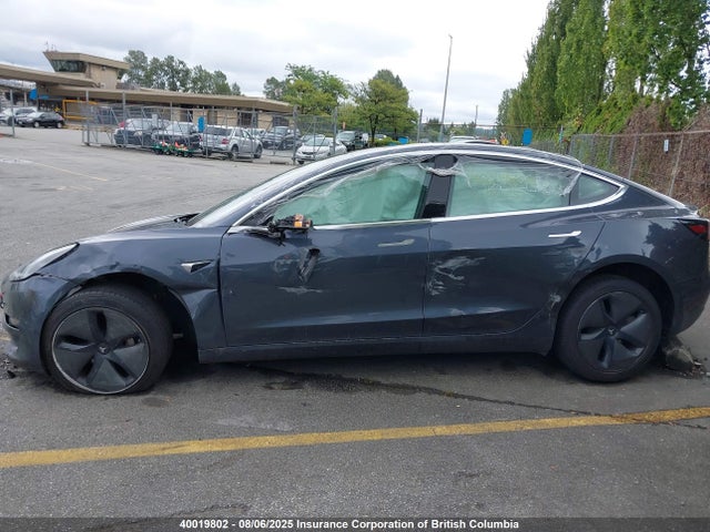 5YJ3E1EA4LF703189 Tesla 2020