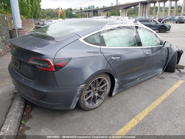 5YJ3E1EA4LF703189 Tesla 2020