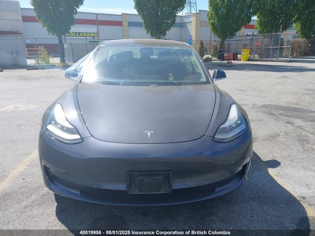 5YJ3E1EA7JF183034 Tesla 2018