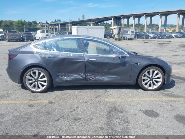 5YJ3E1EA7JF183034 Tesla 2018
