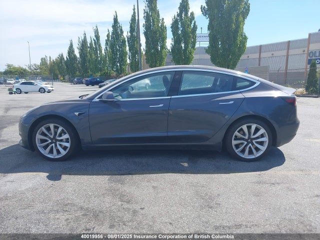 5YJ3E1EA7JF183034 Tesla 2018