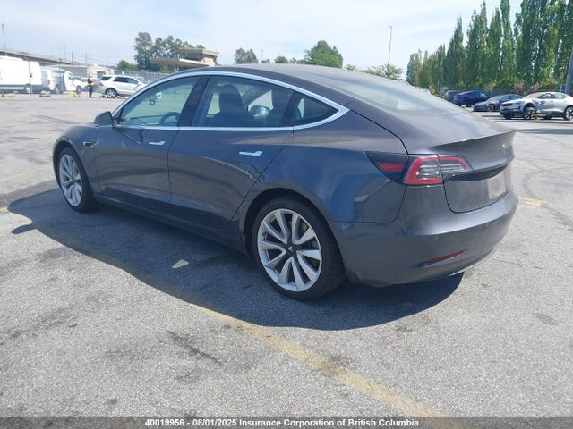 5YJ3E1EA7JF183034 Tesla 2018