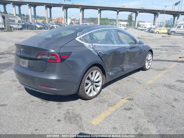 5YJ3E1EA7JF183034 Tesla 2018