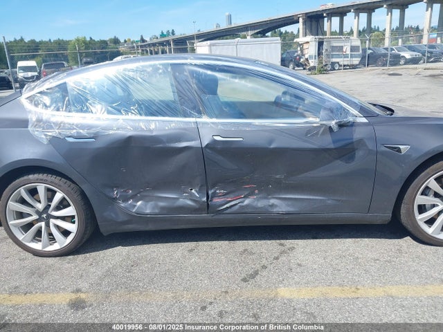 5YJ3E1EA7JF183034 Tesla 2018