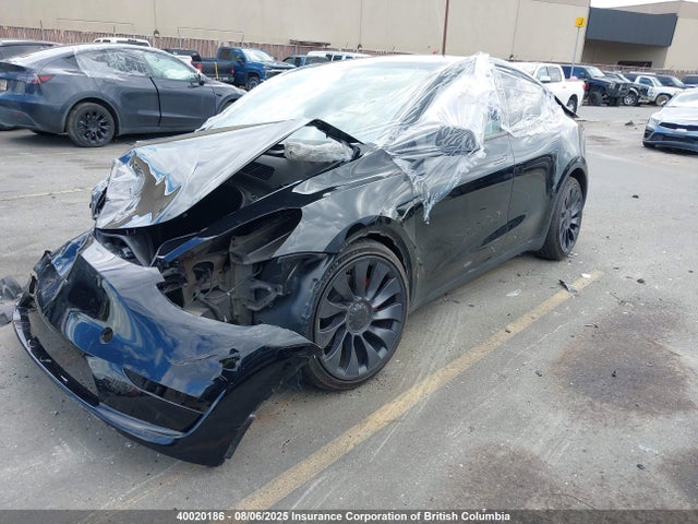 Tesla Model Y 2024 7SAYGDEF3RF092872 Image 2