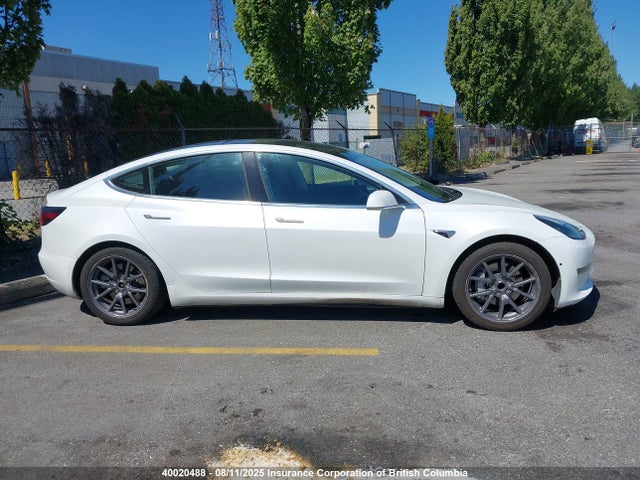 5YJ3E1EA1LF718491 Tesla 2020