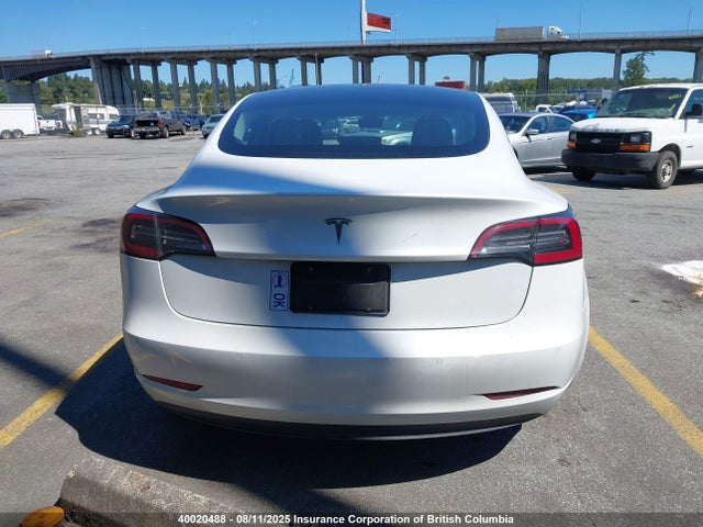5YJ3E1EA1LF718491 Tesla 2020