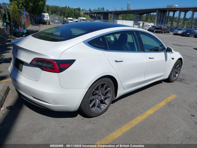 5YJ3E1EA1LF718491 Tesla 2020