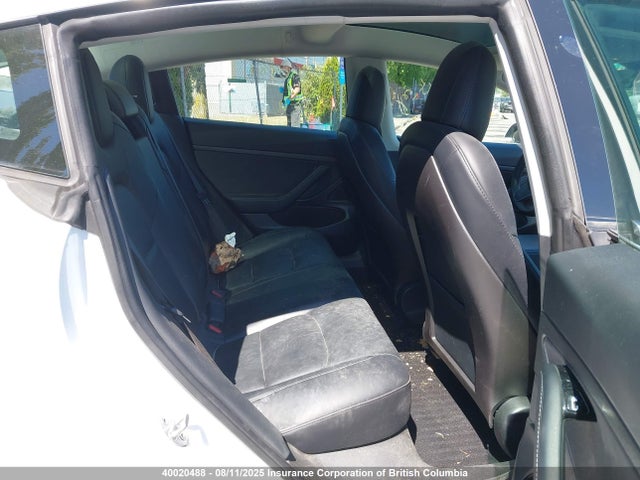 5YJ3E1EA1LF718491 Tesla 2020