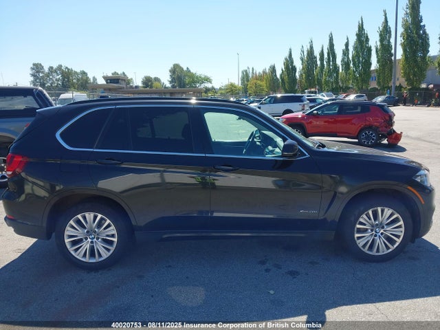 5UXKR6C57F0J77015 BMW 2015