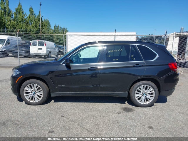 5UXKR6C57F0J77015 BMW 2015
