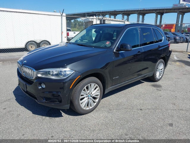 5UXKR6C57F0J77015 BMW 2015
