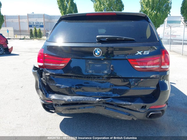 5UXKR6C57F0J77015 BMW 2015