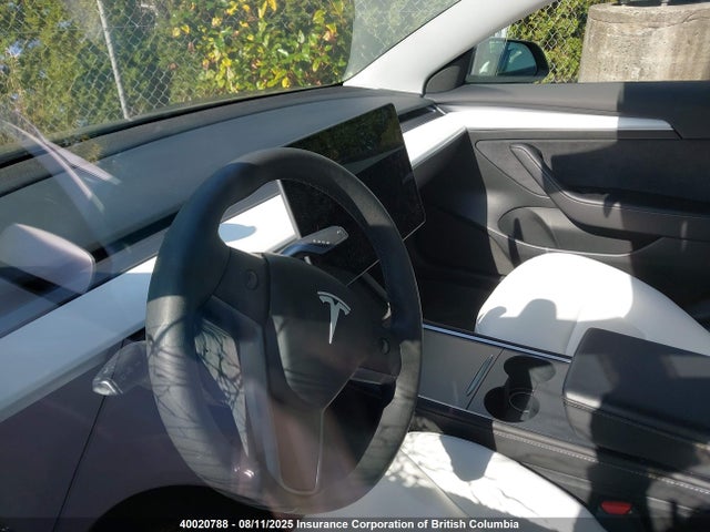 5YJ3E1EA2PF557574 Tesla 2023