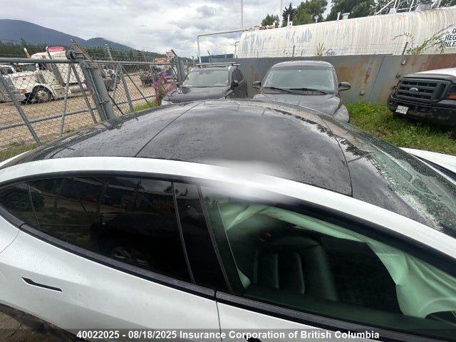 5YJ3E1EA0MF051267 Tesla 2021