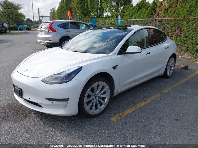 5YJ3E1EB1NF128867 Tesla 2022
