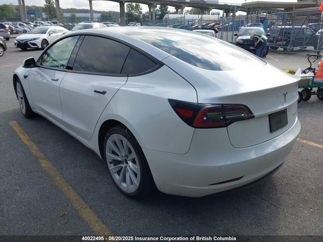 5YJ3E1EB1NF128867 Tesla 2022
