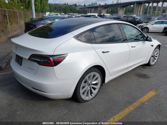 5YJ3E1EB1NF128867 Tesla 2022
