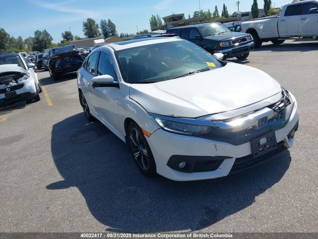 2016 Honda Civic Touring მანქანა იყიდება აუქციონზე, vin: 2HGFC1F92GH102761, აუქციონის ნომერი: 40022417