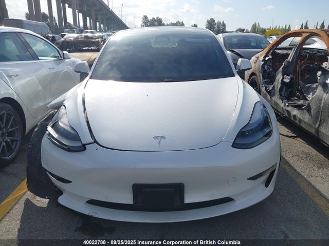 5YJ3E1EA1MF001784 Tesla 2021