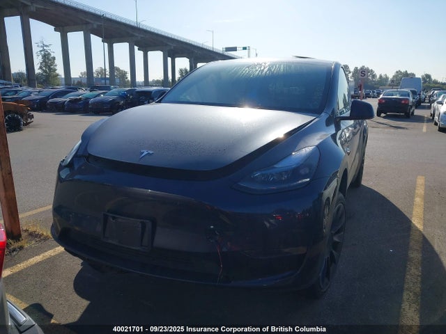 Tesla Model Y 2024 7SAYGDED4RF990704 Image 12