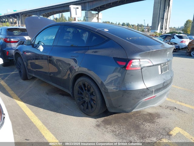 Tesla Model Y 2024 7SAYGDED4RF990704 Image 3