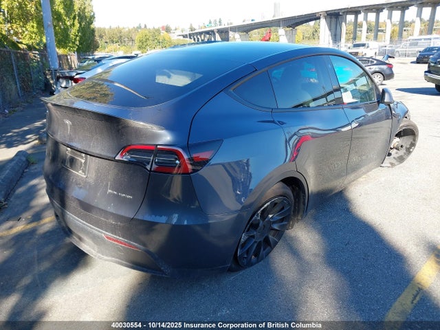 Tesla Model Y 2023 7SAYGDEE0PF776864 Image 4