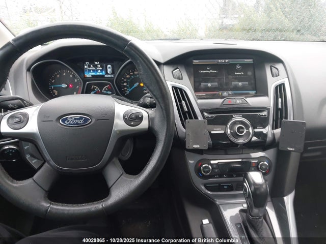 40029865 :رقم المزاد ، 1FADP3J2XEL288894 vin ، 2014 Ford Focus Titanium مزاد بيع