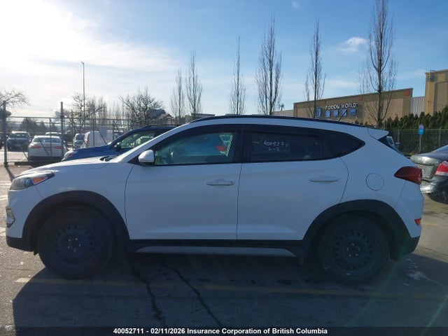 KM8J33A42HU428120 Hyundai TUCSON SE