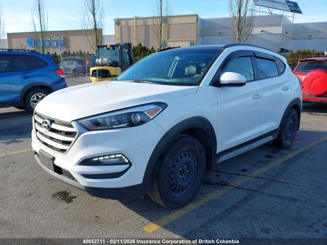 KM8J33A42HU428120 Hyundai TUCSON SE
