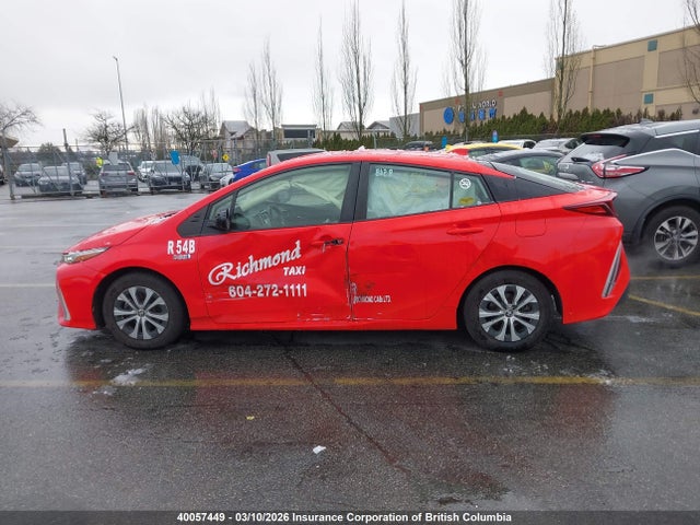 JTDKAMFP8M3163338 Toyota Prius