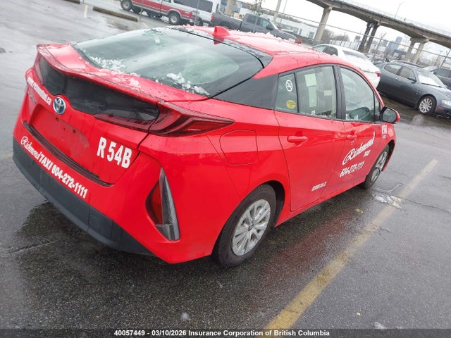 JTDKAMFP8M3163338 Toyota Prius