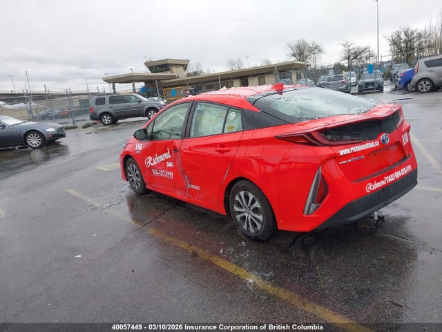 JTDKAMFP8M3163338 Toyota Prius