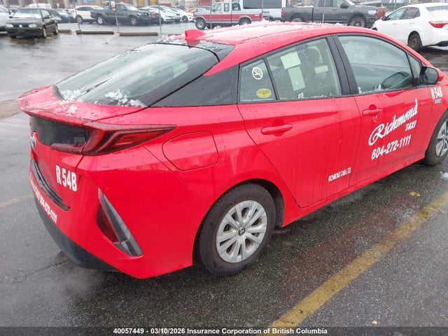 JTDKAMFP8M3163338 Toyota Prius
