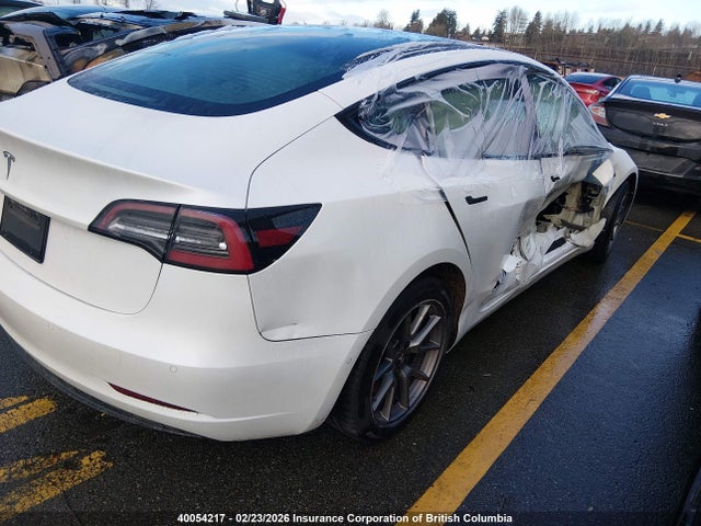 Продажа на аукционе авто 2022 Tesla Model 3, vin: 5YJ3E1EAXNF336883, номер лота: 40054217