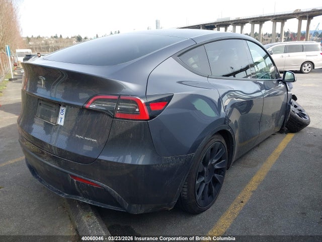 40060046 :رقم المزاد ، 7SAYGAEEXPF696003 vin ، 2023 Tesla Model Y Long Range مزاد بيع