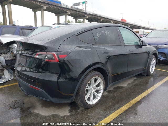 40061393 :رقم المزاد ، LRWYGDFD4PC967717 vin ، 2023 Tesla Model Y مزاد بيع