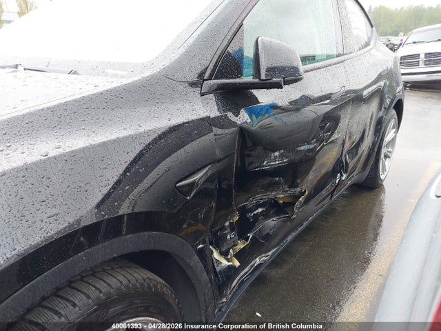 40061393 :رقم المزاد ، LRWYGDFD4PC967717 vin ، 2023 Tesla Model Y مزاد بيع
