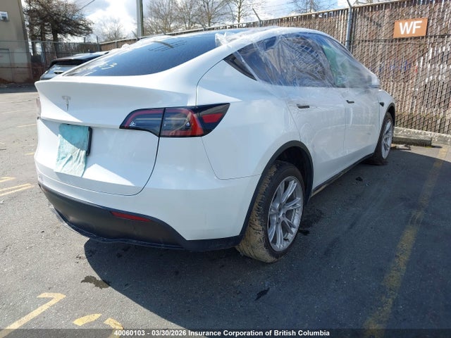 40060103 :رقم المزاد ، LRWYGDFD4PC967782 vin ، 2023 Tesla Model Y مزاد بيع