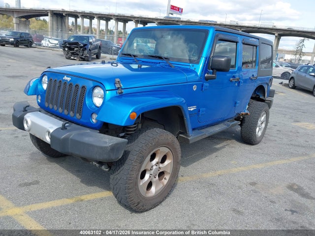40063102 :رقم المزاد ، 1C4BJWEG0FL517904 vin ، 2015 Jeep Wrangler Unlimited Sahara مزاد بيع