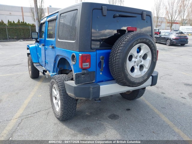 40063102 :رقم المزاد ، 1C4BJWEG0FL517904 vin ، 2015 Jeep Wrangler Unlimited Sahara مزاد بيع