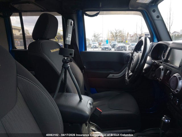 40063102 :رقم المزاد ، 1C4BJWEG0FL517904 vin ، 2015 Jeep Wrangler Unlimited Sahara مزاد بيع