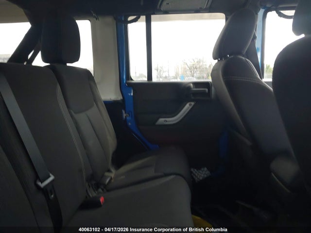 40063102 :رقم المزاد ، 1C4BJWEG0FL517904 vin ، 2015 Jeep Wrangler Unlimited Sahara مزاد بيع