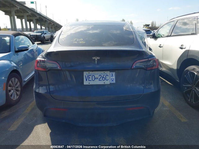 40063647 :رقم المزاد ، LRWYGDFDXPC164054 vin ، 2023 Tesla Model Y مزاد بيع